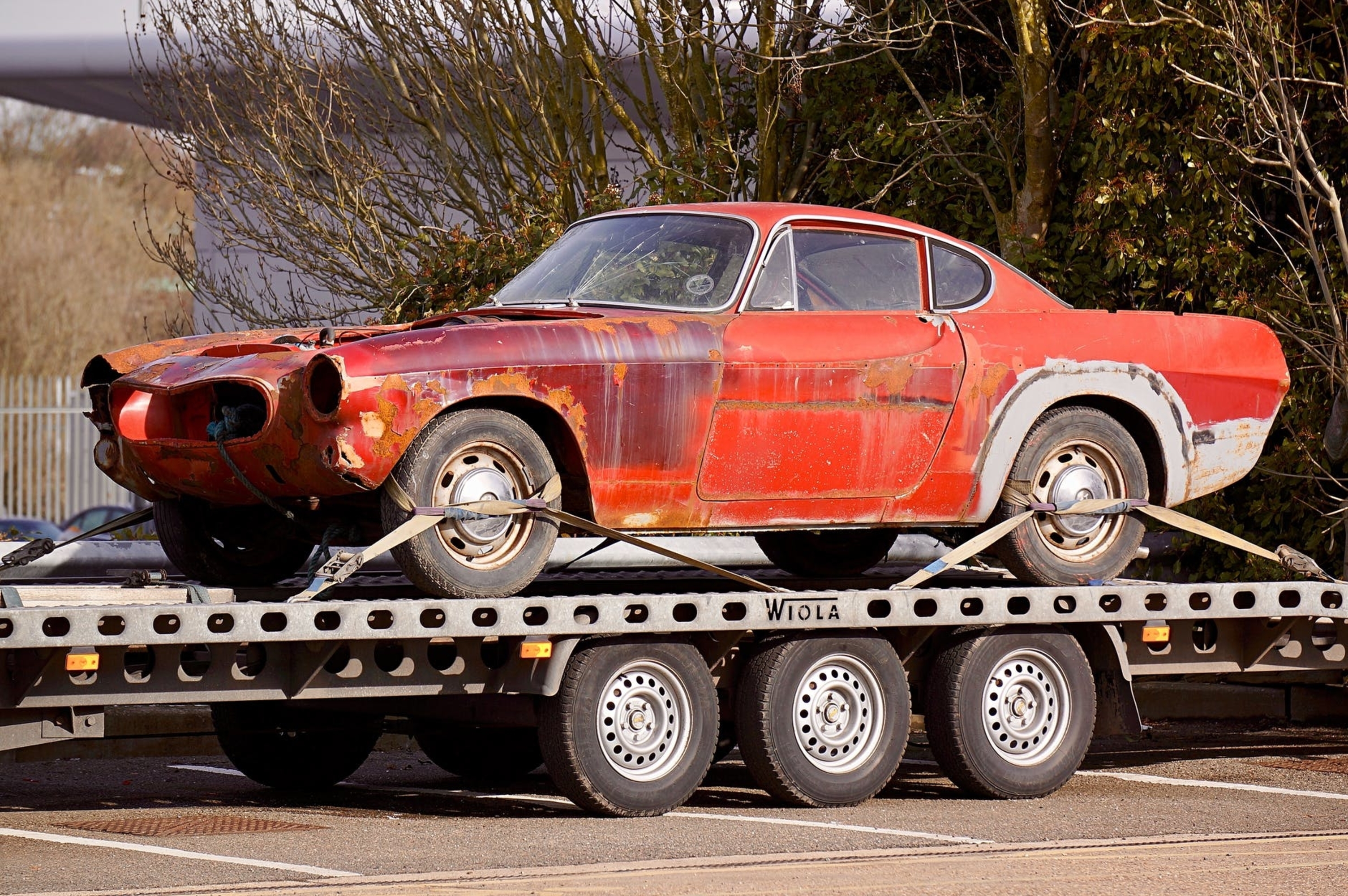 if you want a cheaper way of shipping your car, try an open-air carrier. Note that is is riskier though.